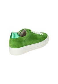 Green suede sneaker with white laces, white rubber sole, and a shiny green heel tab. Features textured fabric and a simple, rounded design.