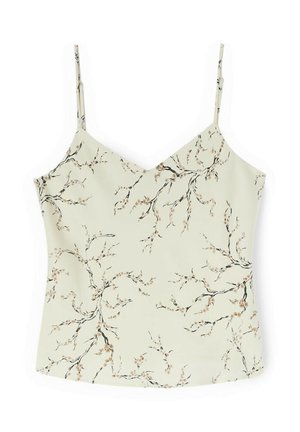 Top camisola color crema claro con tirantes finos y delicado patrón floral de ramas en marrón y negro.