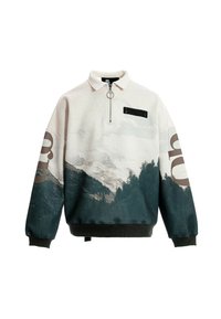 Sudadera crema con estampado de paisaje montañoso, con cuello de media cremallera, detalle de bolsillo negro y puños acanalados.