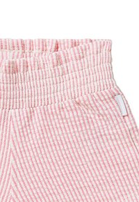 Pantalon en coton avec une taille smockée, présentant un motif rayé rose et blanc. Comprend une petite étiquette sur le côté. Texture douce.