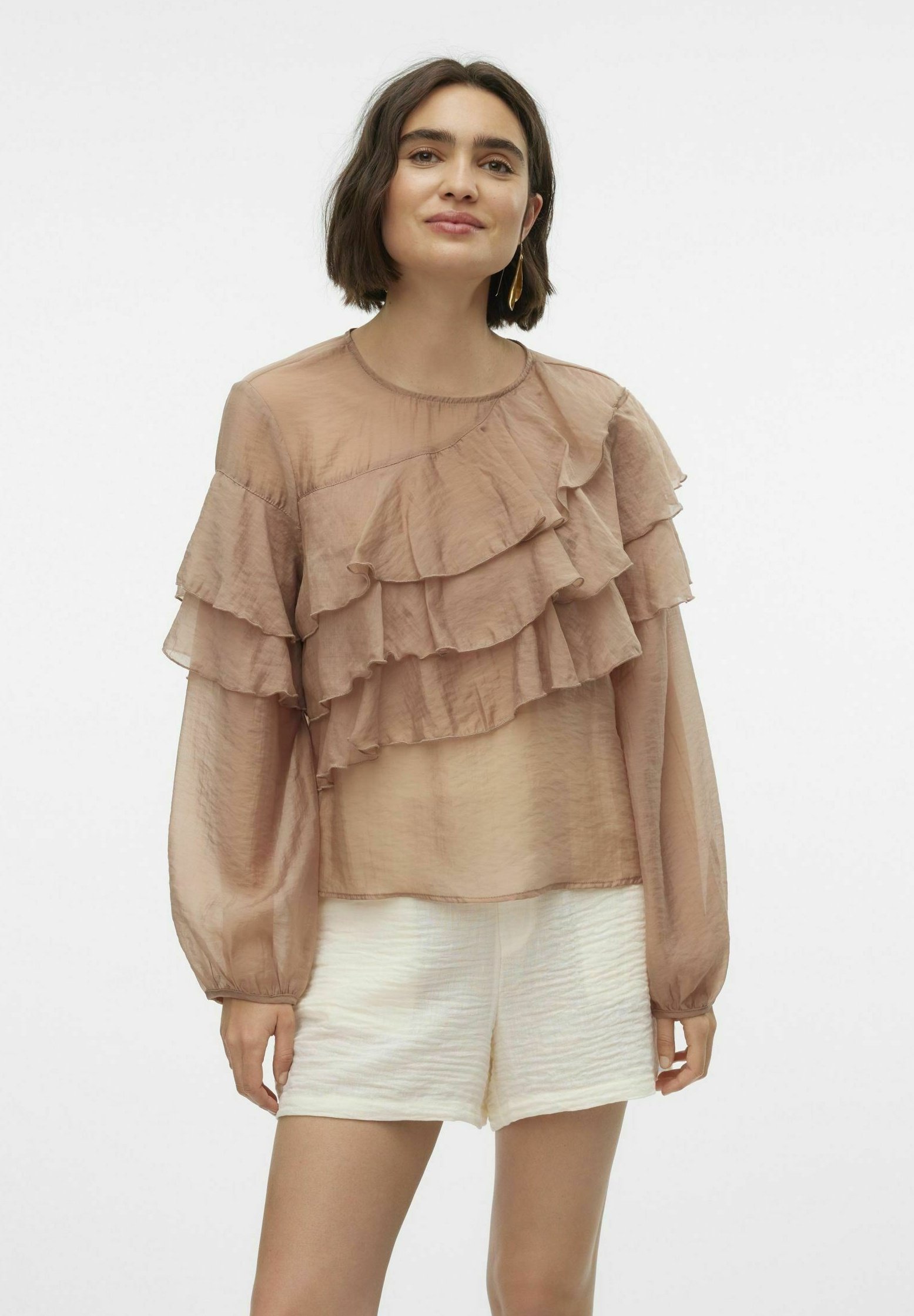 beige ruffle blouse