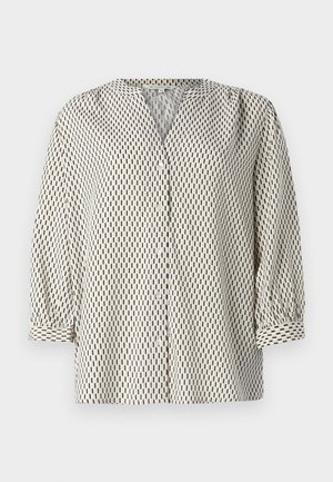 Košeľová blúzka z ľahkej tkaniny s krémovým pozadím a čiernymi vertikálnymi obdĺžnikovými vzormi, s výstrihom do V a nariasenými rukávmi.