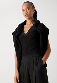 Morgan DELOR - Blūze - noir