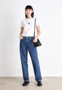 Calvin Klein Jeans MINI FLAP - Handbag - black