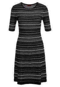 Robe en tricot noir et blanc avec un col rond, des manches courtes et des rayures horizontales présentant des motifs variés et des détails en points.