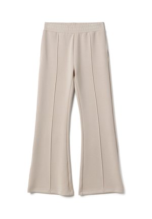 Beige wijde broek met elastische tailleband en verticale naaddetails aan de voorkant op een witte achtergrond.