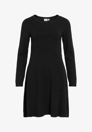 Melnā adīta kleita ar garām piedurknēm un apaļu dekoltē. Pieguļošs augšdaļa ar izplestu svārku, gluda tekstūra un minimālists dizains.