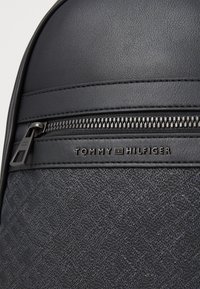 Tommy Hilfiger MONOGRAM SLING BAG - Bum bag - black
