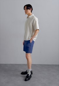 J.LINDEBERG BARON - Shorts - estate blue