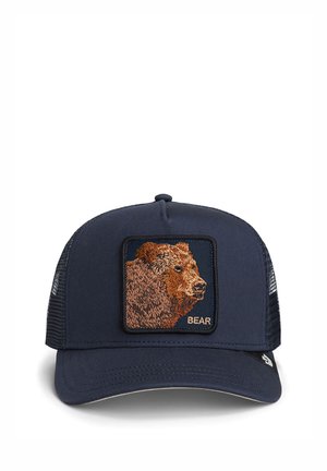 Navy blue trucker cap with mesh back, featuring an embroidered brown bear head patch and the word "BEAR" on the front.