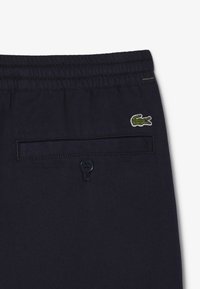 Lacoste Bukser - bleu marine hde