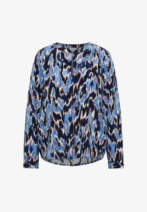 Langærmet bluse med blå, sort, hvid og pink abstrakt mønster og kort lynlås foran ved halsudskæringen.