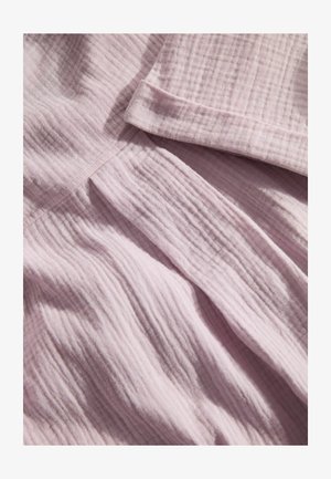 Light pink fabric, textured with soft, wrinkled surface. Features subtle stripes and a folded edge. Ideal for clothing or home textiles.