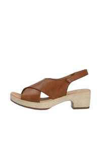 Brown leather sandal with cross-strap design, open toe, and slingback; features a textured beige wedge heel and padded footbed.