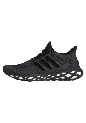 Black athletic running shoe with mesh upper, three side stripes, cushioned patterned sole, and lace-up closure, shown in profile on white background.