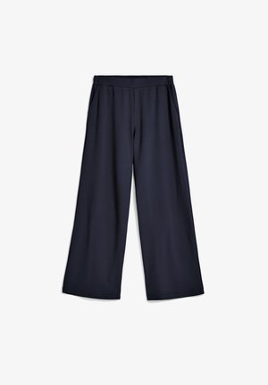 Marineblaue Weitbein-Hosen aus weichem Stoff mit einem elastischen Bund und Seitentaschen, die eine glatte Textur und eine lockere Passform bieten.