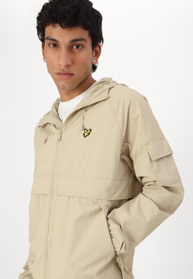 Veste Coupe-vent Vintage Izod Homme – Beige Plaid, Doublée, Taille L – Golf/Preppy