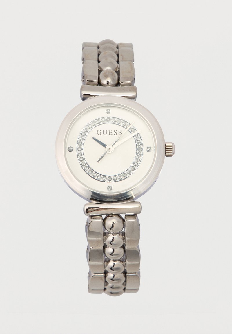 Zilveren horloge van roestvrij staal met een ronde kast, een wit uurwerk, kristalaccenten en een gepolijste schakelarmband.