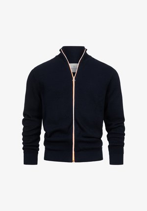 Maglione a zip blu navy con colletto alto, dotato di una zip arancione a contrasto, polsini a coste e un motivo testurizzato.