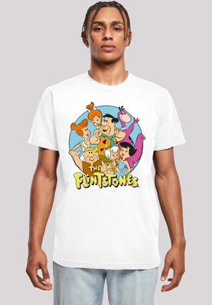 White t-shirt featuring cartoon characters from "The Flintstones" in vibrant colors, with a circular graphic design and bold text.