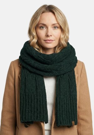 Tummanvihreä ribbineulottu huivi, jossa on pehmeä ja paksu malli. Päät ovat hieman rispaantuneet. Huivi on löysästi kaulassa.