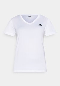 Camiseta blanca de manga corta con cuello en V, confeccionada en tela suave, que presenta un logo negro en el pecho izquierdo y dobladillos en las mangas.