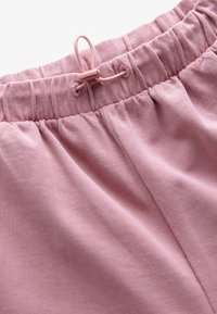 Next REGULAR FIT - BARREL  JOGGERS - Verryttelyhousut - pink washed