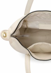 Kreemjas nahast käekott tekstuurse pinnaga, millel on must tõmblukk, sisemine tõmblukuga tasku ja beež vooder. Kaasas kaks lühikest sangad.