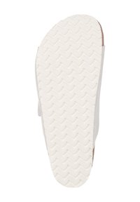 Semelle en caoutchouc blanche avec un motif de bande de roulement en zigzag. La partie supérieure est en matériau gris clair et présente un design blanc simple.
