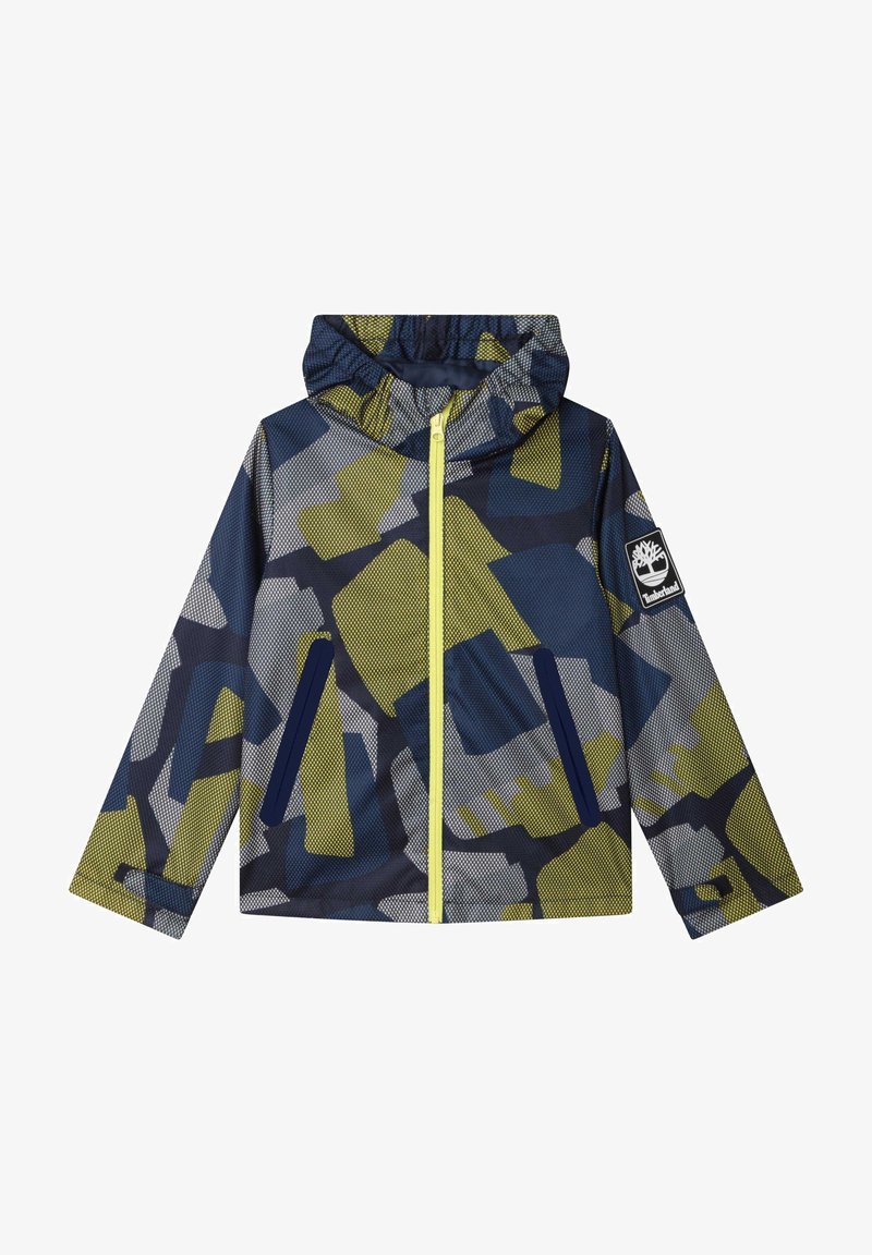 Bunda s kapucí, zdobená geometrickým vzorem v námořnické modři, olivové a šedé barvě. Přední zip, dvě námořnicky modré kapsy a logo na rukávu.