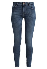 Tummansinisen denimin kapeat farkut, joissa on sileä pinta, viiden taskun malli ja nappisuljenta. Hieman haalistumaa edessä.