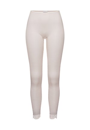 Rippierte cremefarbene Leggings mit hoher Taille, versehen mit feiner Spitzenverzierung am Knöchel. Glatte Textur und figurbetontes Design.
