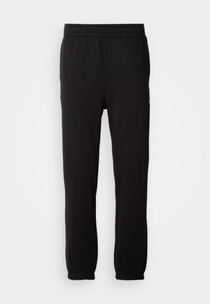 Calvin Klein Jeans MONOGRAM  - Tracksuit bottoms - black