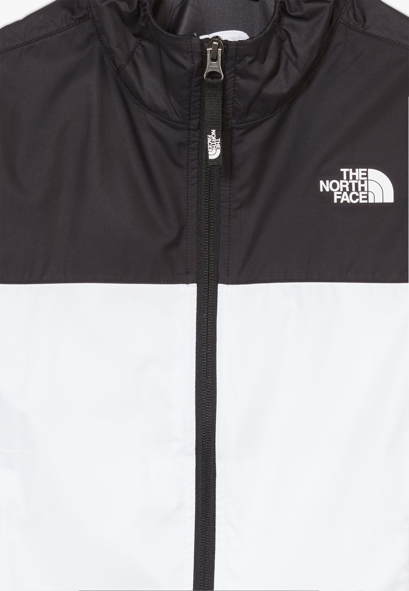 The North Face Youth Reactor Veste Coupe Vent White Black Blanc Zalando Fr