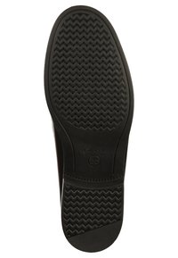 Suola di scarpa in gomma nera con un battistrada a zigzag, caratterizzata dal logo "GEOX" e un dettaglio circolare di branding. Superficie testurizzata per una migliore aderenza.