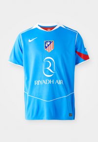 Blue football jersey with white accents, featuring a team logo and sponsor name "RIYADH AIR" in white. Made from breathable fabric.