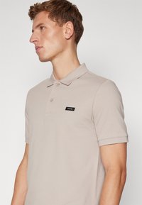 Calvin Klein BUTTON - Poloshirts - atmosphere