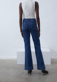 Anna Field Flared jeans - dark-blue denim