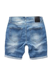 Denim shorts in light blue with a faded pattern, rolled cuffs, and two back pockets. Black leather label on waistband.