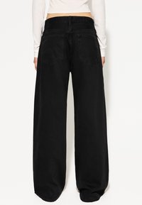 Bershka WIDE-LEG - Wide Leg - black