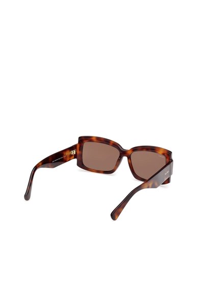 Tortoiseshell sunglasses featuring a square frame, brown lenses, and sleek arms with subtle branding on the temple. Matte texture finish.
