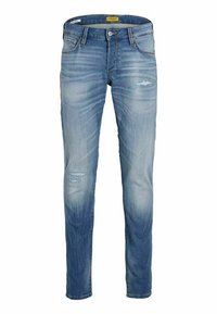 Jeans de mezclilla azul claro con un ajuste slim, que presentan áreas desgastadas y rasgadas, y una cremallera en la bragueta. Diseño clásico de cinco bolsillos.