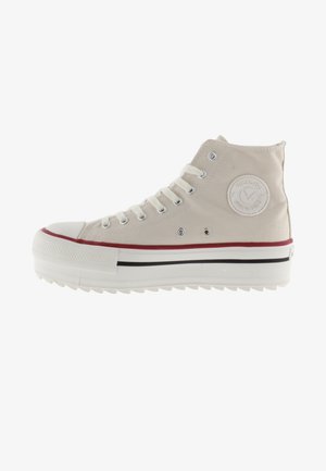 Hoge sneakers van canvas in off-white met een rubberen zool, voorzien van een logo patch, rode en zwarte strepen en metalen oogjes.