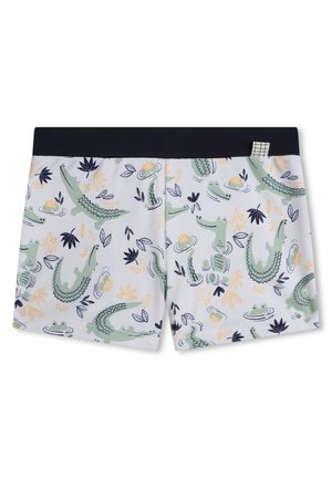 Shorts de bain avec une ceinture bleu marine, présentant un fond clair et un motif ludique de crocodiles verts, de nénuphars et de feuilles.