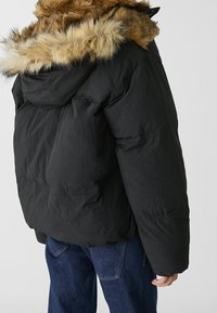 Stradivarius Vinterjakker - black