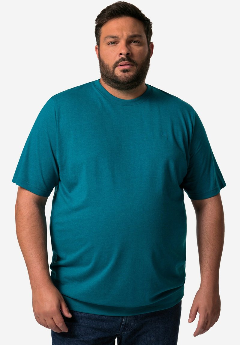 Tyrkysové tričko s krátkým rukávem vyrobené z bavlněné směsice, s kulatým výstřihem a malým logem na levé hrudi. Hladká textura, volný střih.