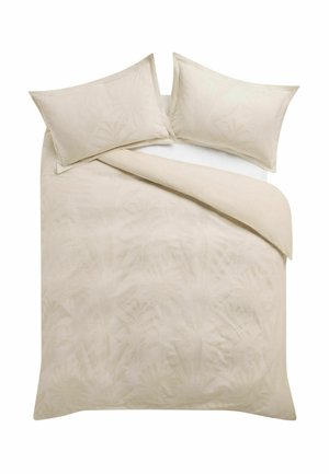 Beige bedding set with subtle floral pattern, including two pillows and a partially folded duvet on a white background.