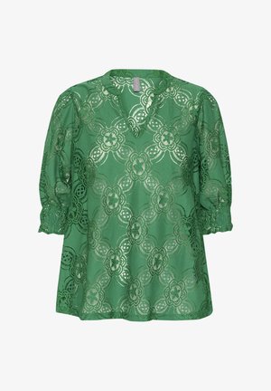 Green lace blouse featuring floral pattern, V-neckline, and gathered short sleeves with elastic cuffs. Lightweight and textured fabric.