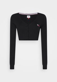 Černý žebrovaný zkrácený kardigan s dlouhými rukávy, třemi předními knoflíky, výstřihem do V a malým logem Tommy Jeans na hrudi.
