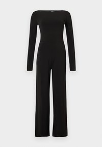 Μαύρη ολόσωμη φόρμα με μακρύ μανίκι και φαρδύ παντελόνι, με εφαρμοστή μέση και λαιμόκοψη σκαφάκι, παρουσιάζεται σε απλό φωτεινό φόντο.